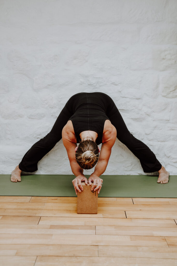 Spread Foot Forward Bend - Posture Ellie